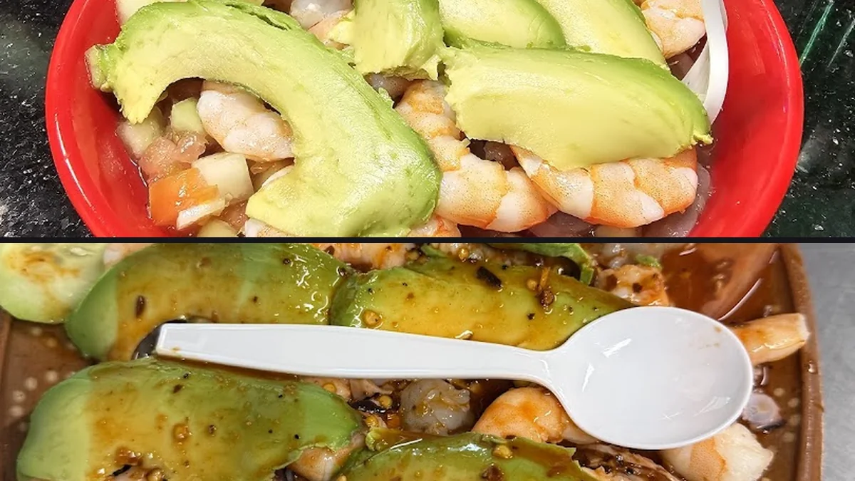 Fresh mariscos arranged on wide plates.