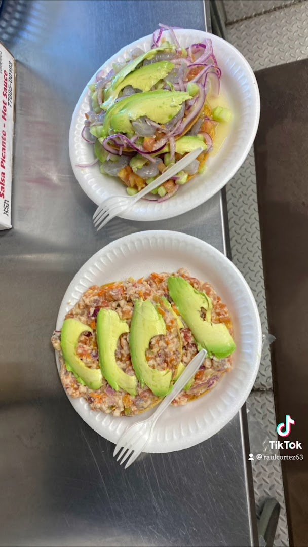 Tostadas topped with shrimp and ceviche.
