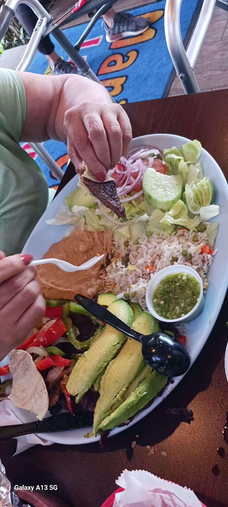 Printed menu with seafood and taco sections.